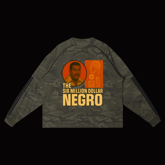 A long-sleeve camouflage crewneck shirt with a graphic print on the front. The graphic features a portrait of Pablo Escobar inside an orange circle, alongside an orange ID-style badge graphic and the text 'THE SIX MILLION DOLLAR NEGRO' in yellow and white.